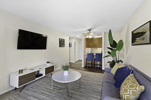 a living room with a couch and a coffee table